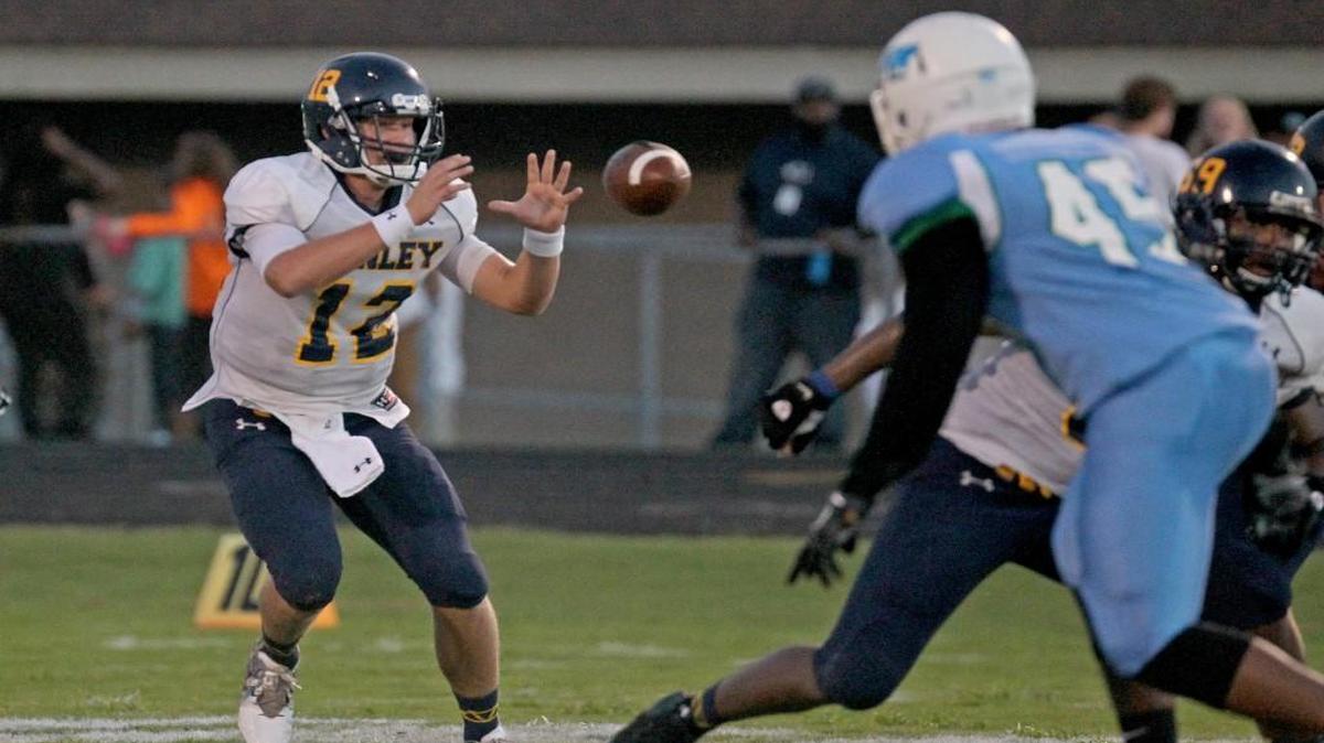 DH Conley quarterback Holton Ahlers (12) receives snap during the first half of DH Conley Varsity High School football game against JH Rose Varsity High School in Greenville, N.C. on Friday, September 23, 2016.