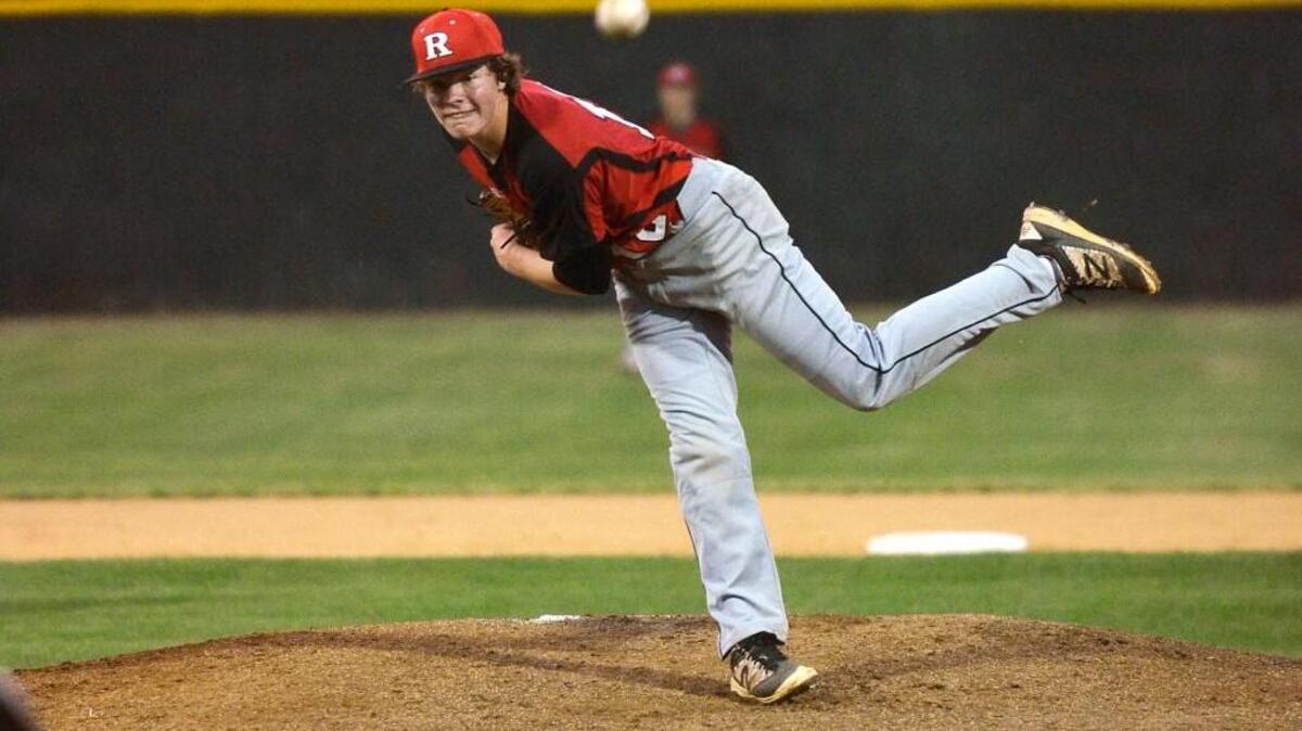 Rolesville lefty Alex Hart (12) lets a pitch fly in the Rams’ first-round N.C. High School Athletic Association 4A baseball playoff game against Conley High in Greenville, N.C. Tuesday, May 10, 2016.