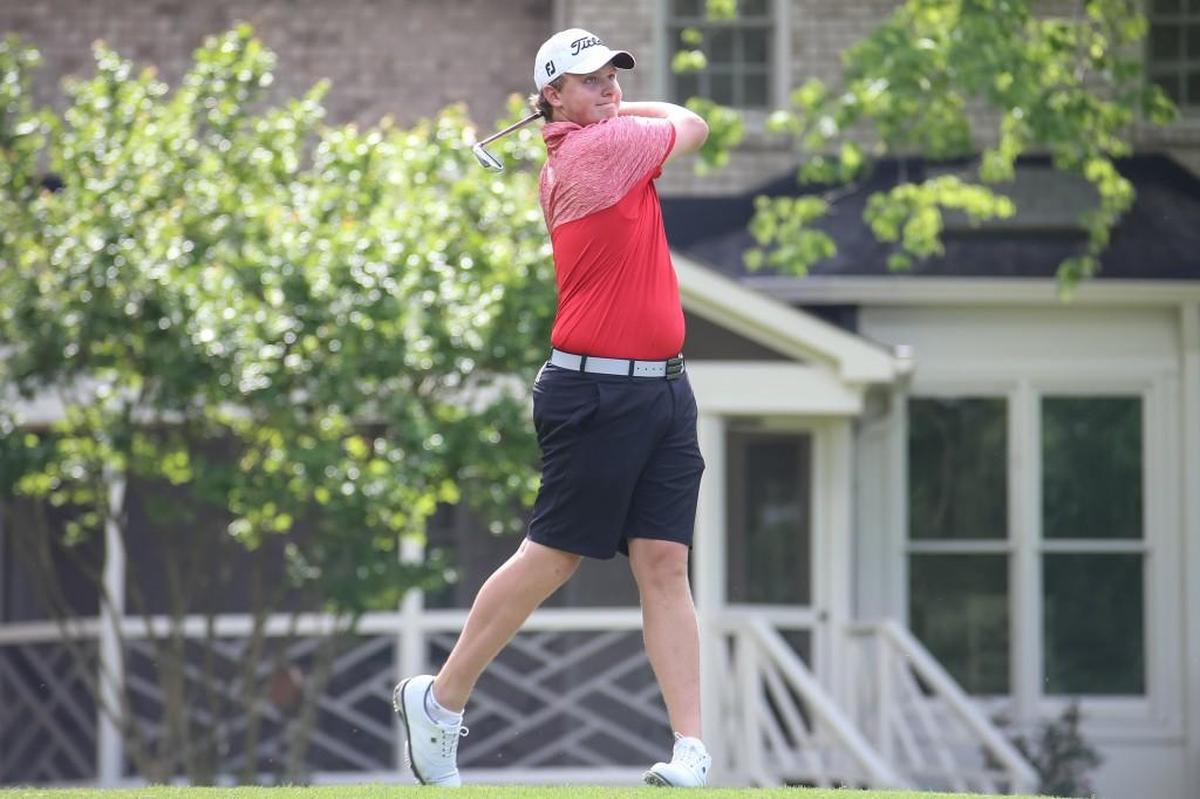Middle Creek's Jack Marcotte tees off during the SWAC conference golf championship in Cary on Wednesday, April 26, 2017.