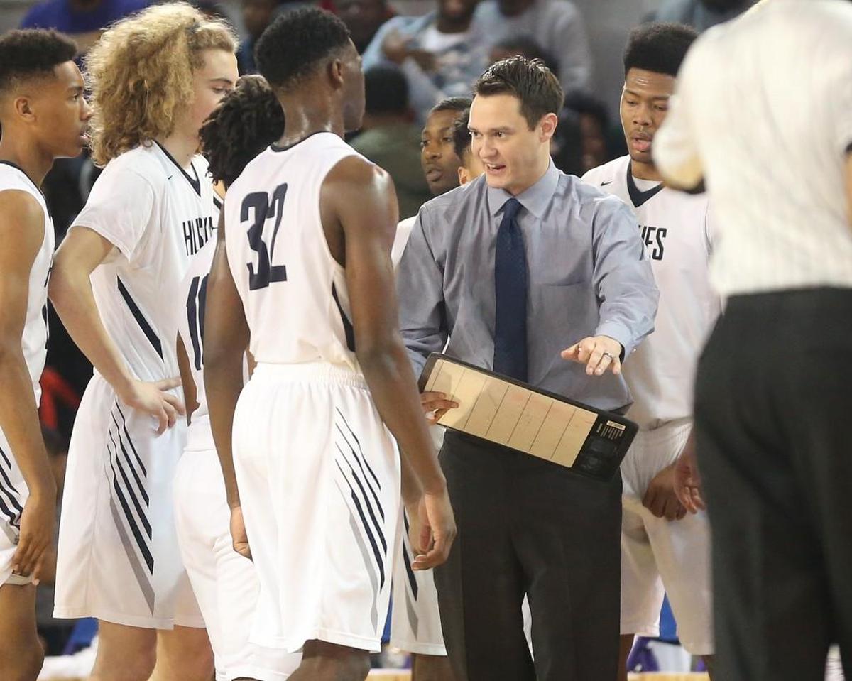 Heritage head coach Tilden Brill gives his team a play to break the South Central press. The South Central Falcons and the Heritage Huskies played in the boys 4A Eastern Regional basketball finals at East Carolina University on Saturday, March 3, 2018.