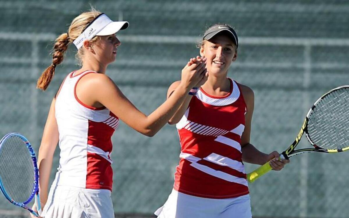 
Sanderson's Dylan Cannon, left, and Anna Scott Holshouser compete in the Cap-8 Conference Doubles Tennis Championships in Raleigh, N.C. on Wednesday, October 14, 2015.
