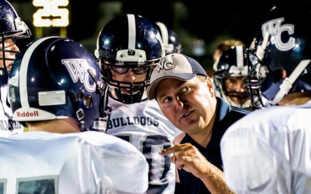 
Coach Steven Cochran of Wake Christian talks to his players during a timeout last season at Ravenscroft.
