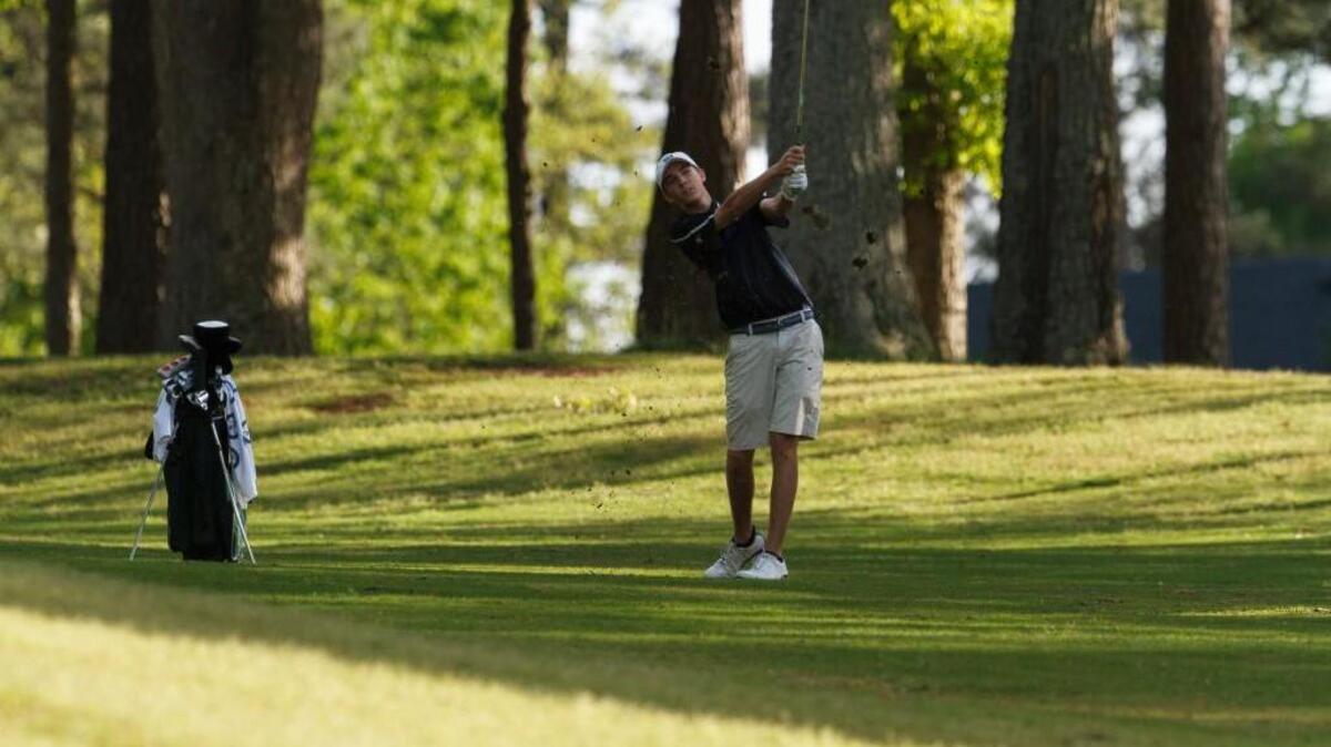 Rob McPartland takes his second shot into the green on sixteen during the SWAC Confrence Chamionship Golf Tournament at Wildwood Green Country Club in Raleigh, NC on Monday April 27, 2015.