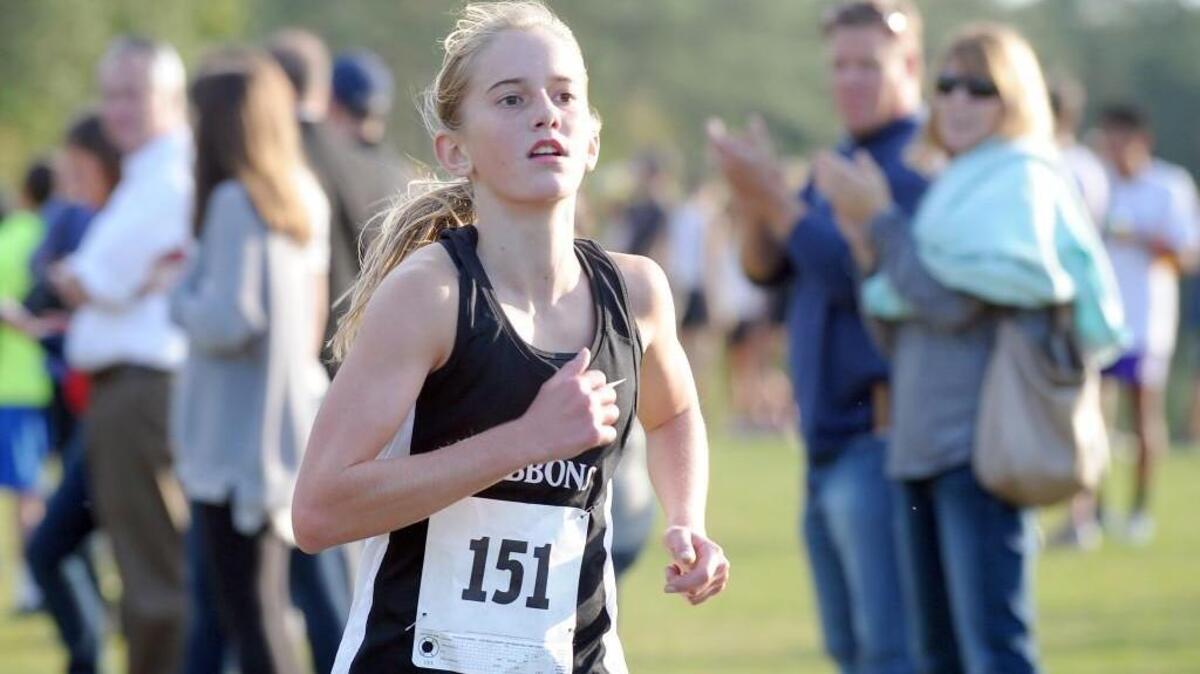 Cardinal Gibbons’ Marissa Bishop placed third last fall at the PAC-6 cross country championships in Cary.
