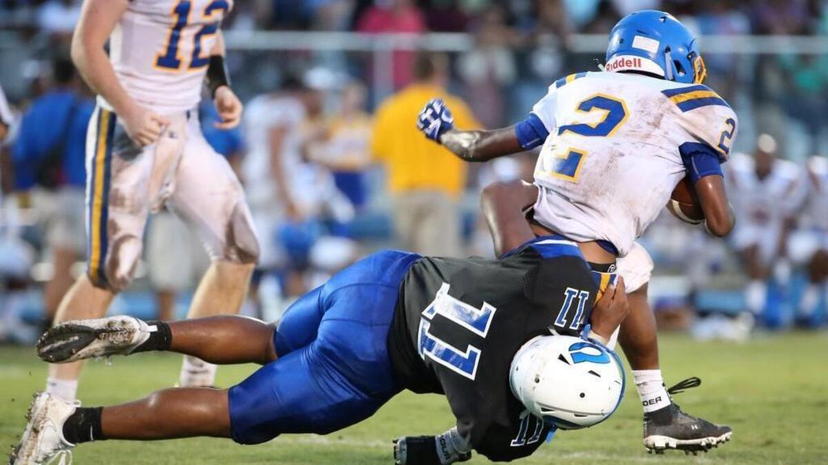 Garner’s Donovan Evans ( 2) gets tackled by Clayton’s Savion Jackson (11) in 2017. Garner vs. Clayton is Friday and will be the first big game of the season.