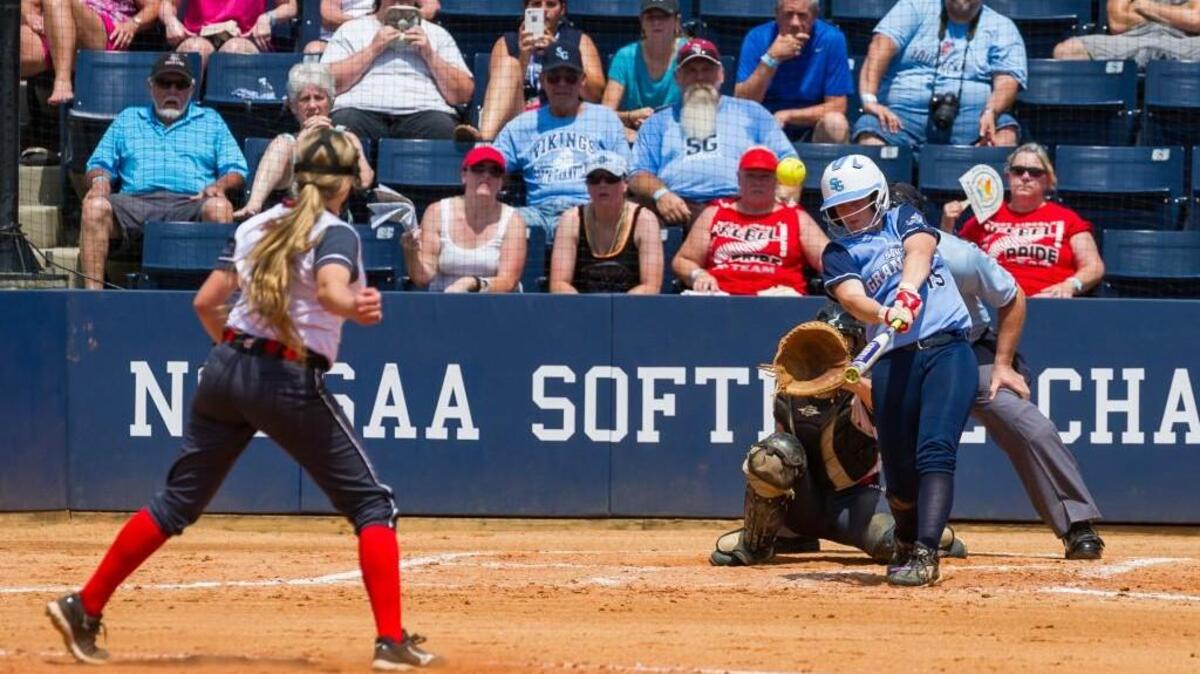South Granville's Miranda Barker (15) drives the ball during West Lincoln's 4-0 victory over South Granville during game 2 at UNC Greensboro softball stadium in Greensboro, NC on Saturday, June 4.