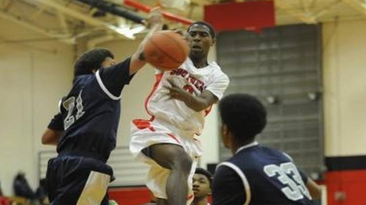Southern’s J’Tori Christmas, center, deals an assist.