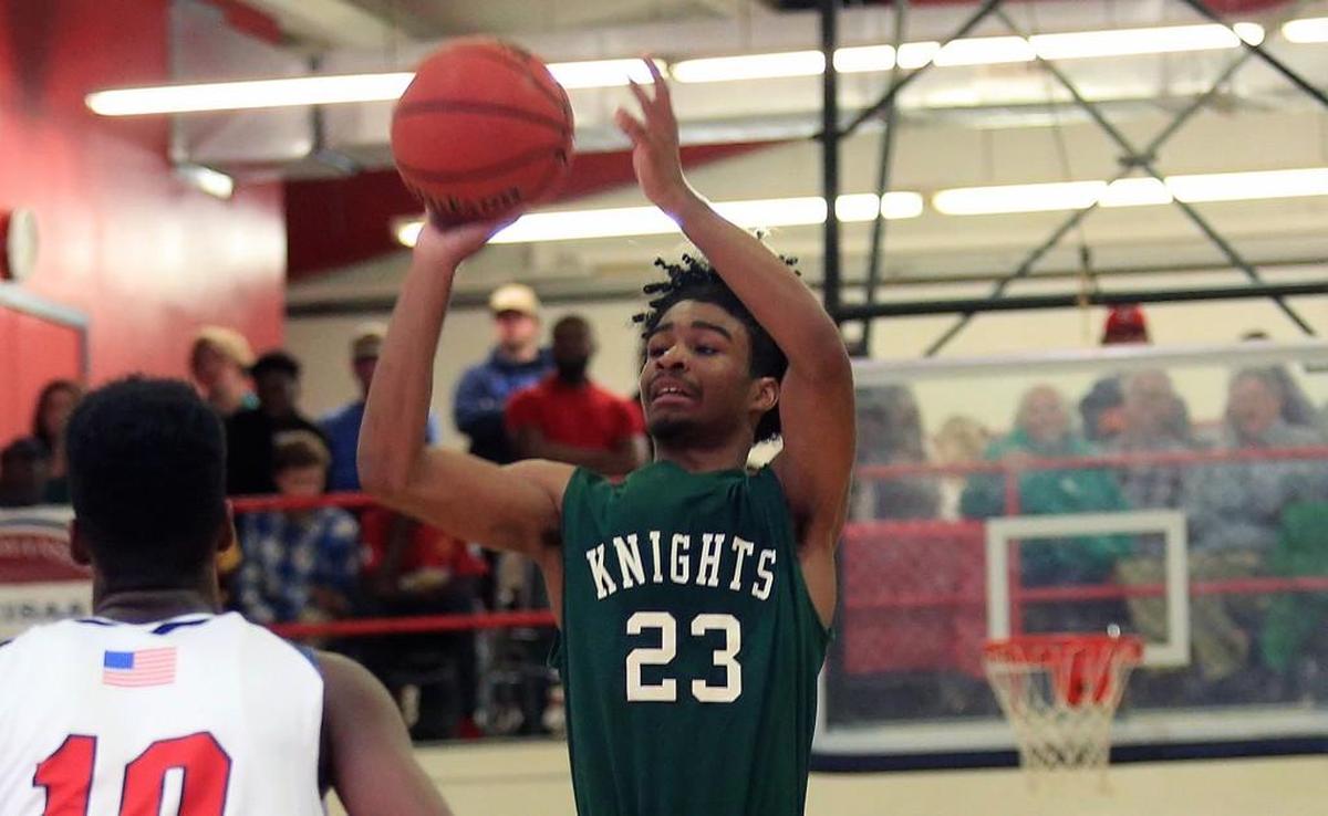 Greenfield's Coby White shoots for the basket during the Greenfield at Wayne Country Day basketball game on January 20, 2017.