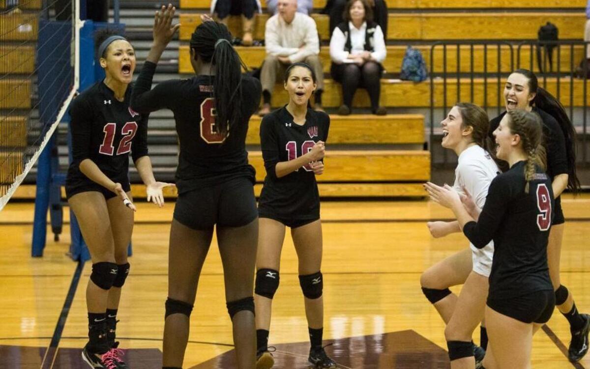 Wakefield celebrates following a point during a high school volleyball game against East Chapel Hill in Raleigh, N.C. on Wednesday, Oct. 26, 2016.