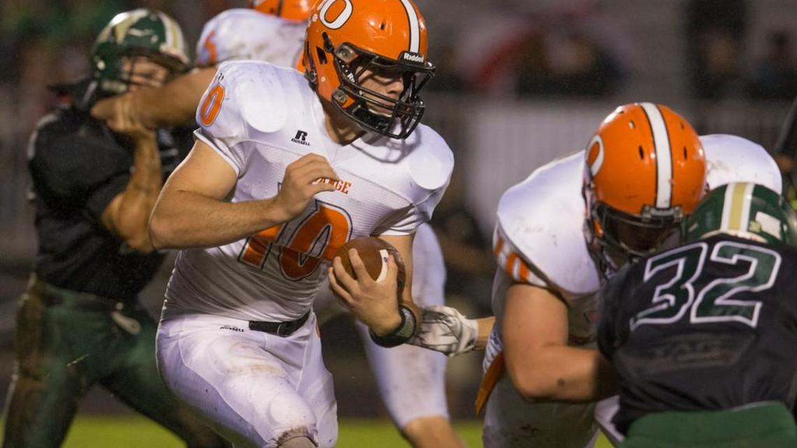 Orange back Bryse Wilson (10) looks for yardage against Northwood’s during a Big 8 football Game on Oct. 1 in Pittsboro. Wilson also has started games this year at linebacker, quarterback and receiver for Orange – and is the Panthers’ punter, too.
