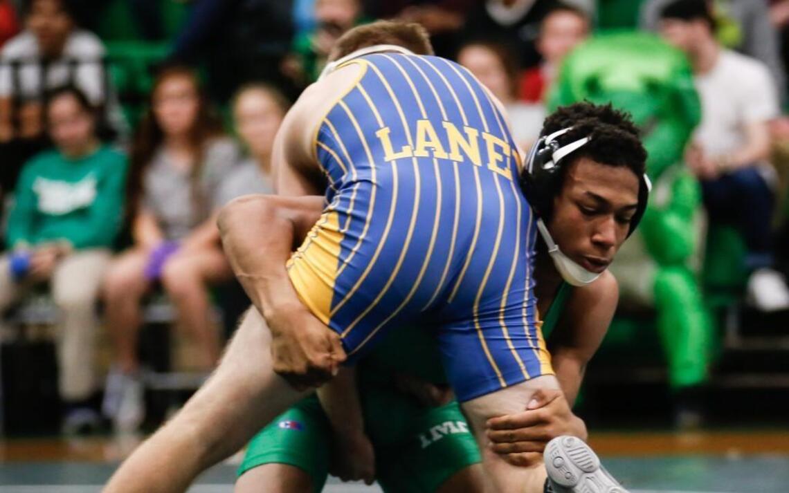 Cary falls to Laney in NCHSAA 4A East wrestling final; Riverside loses in third round
