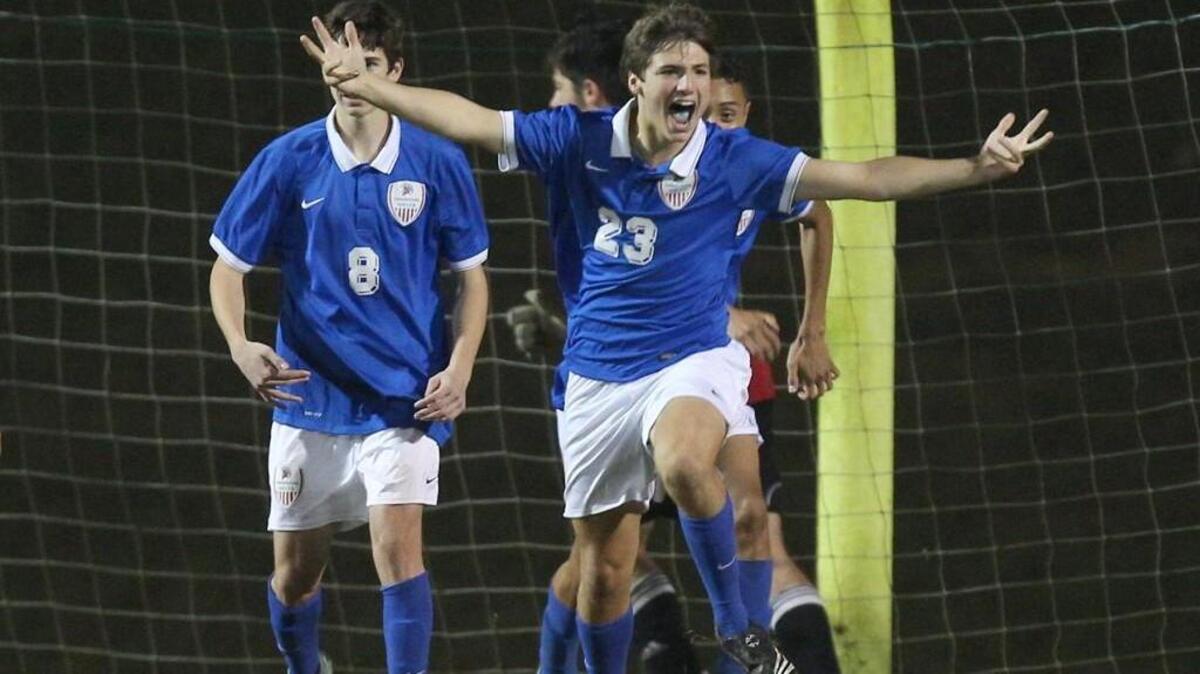 Sanderson’s Brady Lozaw (23) celebrates a goal during the Spartans’ 5-0 4A playoff victory over Garner on Wednesday.