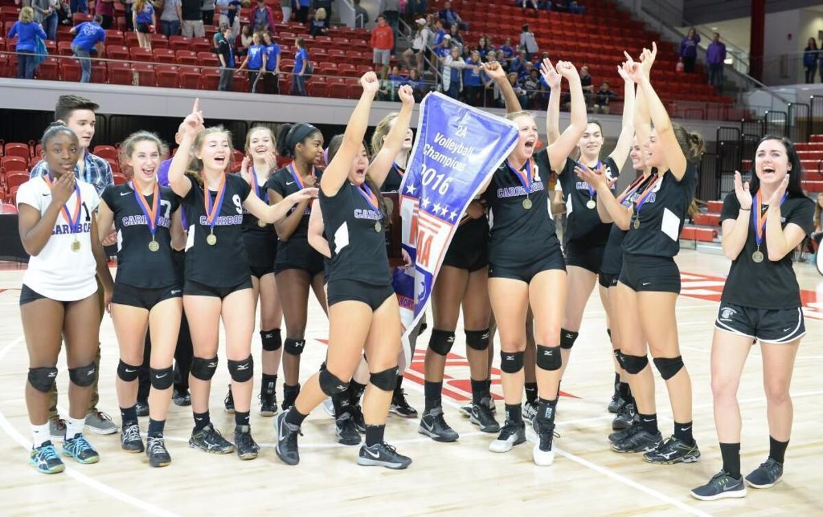 Carrboro celebrates the win. The Carrboro Jaguars played the Maiden Blue Devils for the NCHSAA 2A volleyball championship that took place at the N.C. State Reynolds Coliseum in Raleigh, N.C. on Saturday, November 5, 2016. Carrboro 3-1.