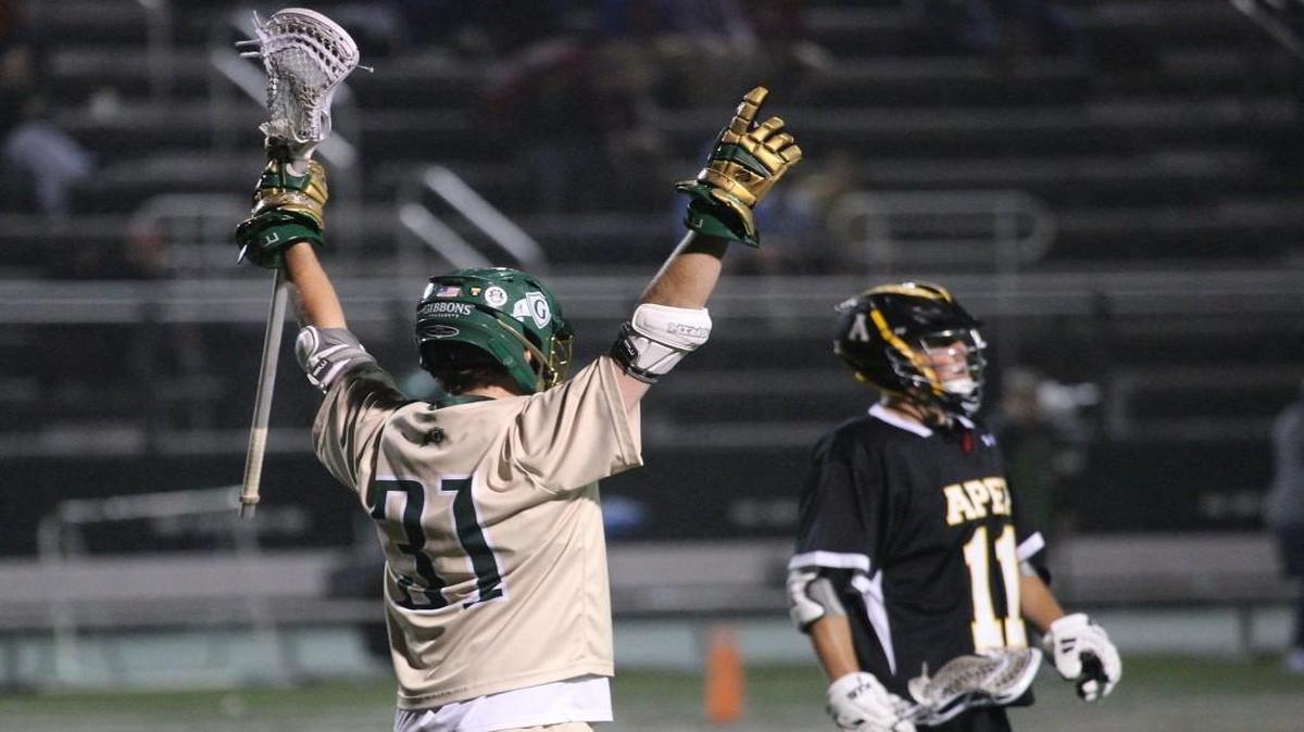 Cardinal Gibbons Charles Van Dyke (31) is happy with his score during the Cardinal Gibbons Lacrosse game with the Apex Cougars at Cardinal Gibbons high on May 12, 2017. Cardinal Gibbons won the game 15-5.