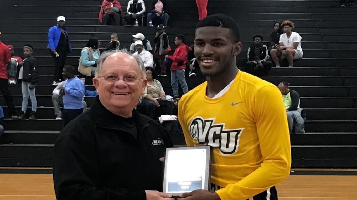 Jay M. Robinson (N.C.) standout and VCU signee Lavar Batts Jr. poses with Beach Ball Classic executive director and Myrtle Beach Mayor John Rhodes after being named North Carolina team MVP at Saturday’s Carolinas All-Star Classic.