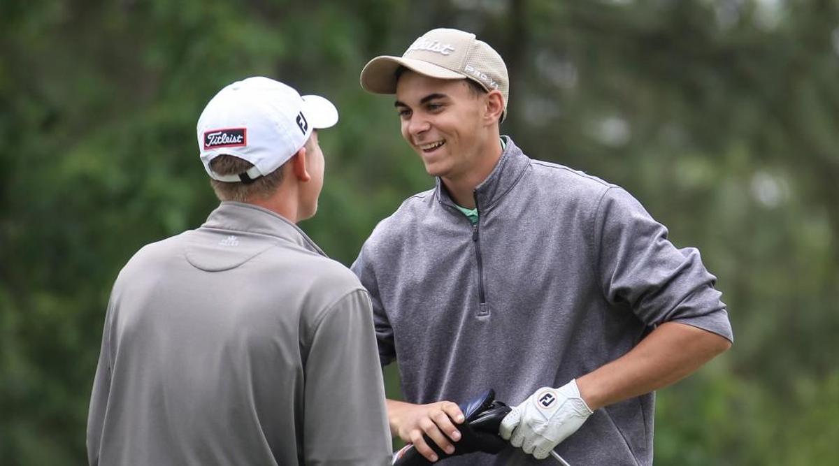 Pinecrest's AJ Beechler, right, shares a laugh with Green Hope's Jack Massei during the NCHSAA 4A State Championship for boys golf at Pinehurst on Tuesday, May 9, 2017. Beechler finished first individually, and Massei finished third.