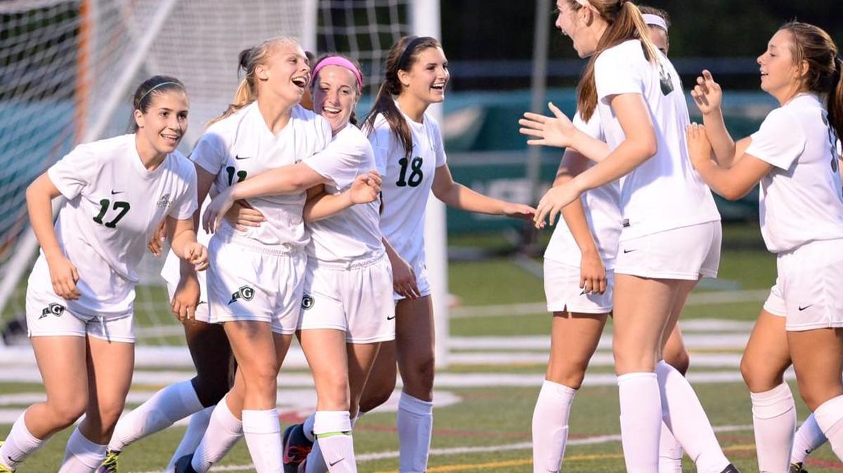 Gibbons girls celebrate a goal after one their 3 goals during the girls soccer game played at Cardinal Gibbons on Saturday, May 14, 2016. Cardinal Gibbons won 3-1.