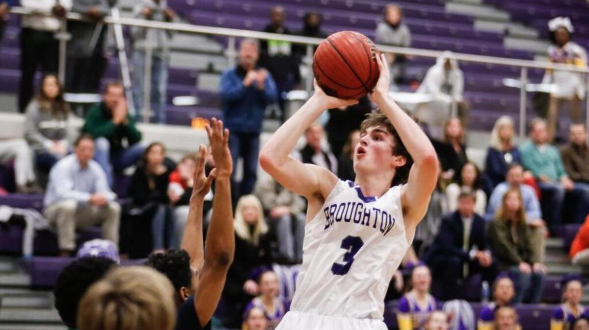 Broughton freshman guard Carson McCorkle (3) puts up a jumper during Leesville Road's boys basketball game at Broughton on Tuesday, December 13, 2016. Leesville Road won the game 66-58 in overtime.