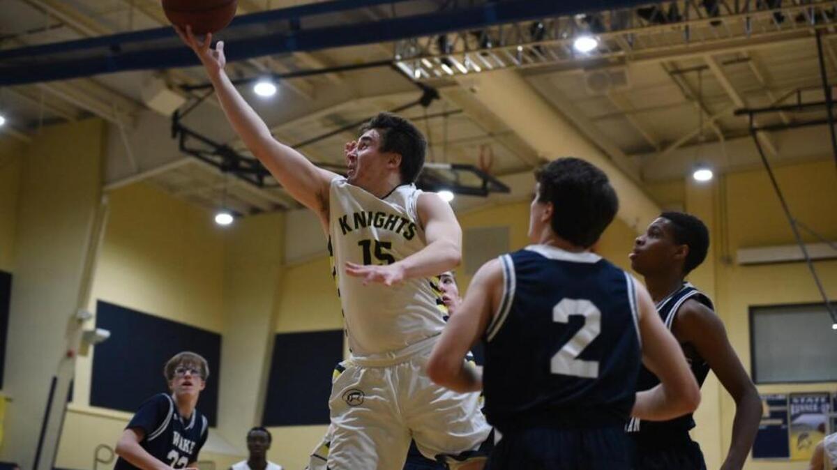 North Raleigh Christian Academy’s Greyson Kelley (15) shoots the ball as the Wake Christian Academy Bulldogs took on the North Raleigh Christian Academy Knights at North Raleigh Christian Academy in Raleigh, NC on Tuesday, January 5.