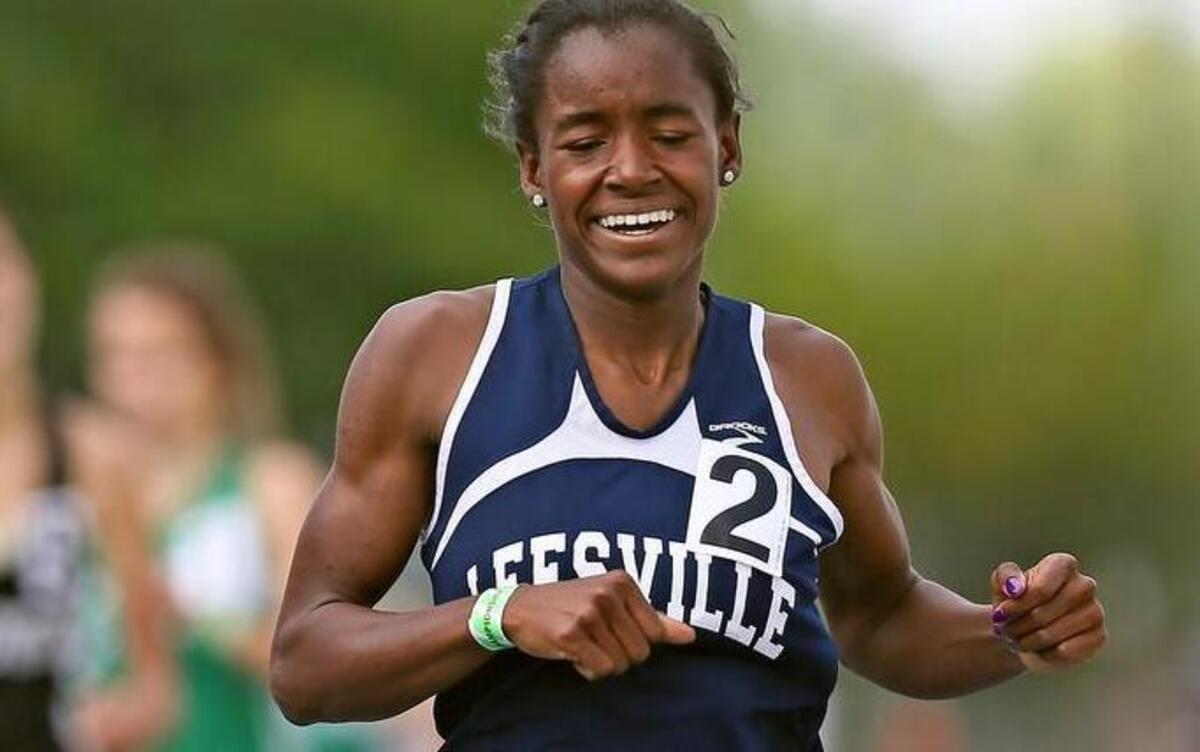 
Leesville Road High’s G’Jasmyne Butler pulls ahead of the pack to win the state championship in the girls 800 meter run during the 4A Track and Field Championships at North Carolina A&T’s Irwin Belk Track on Saturday, May 9, 2015.
