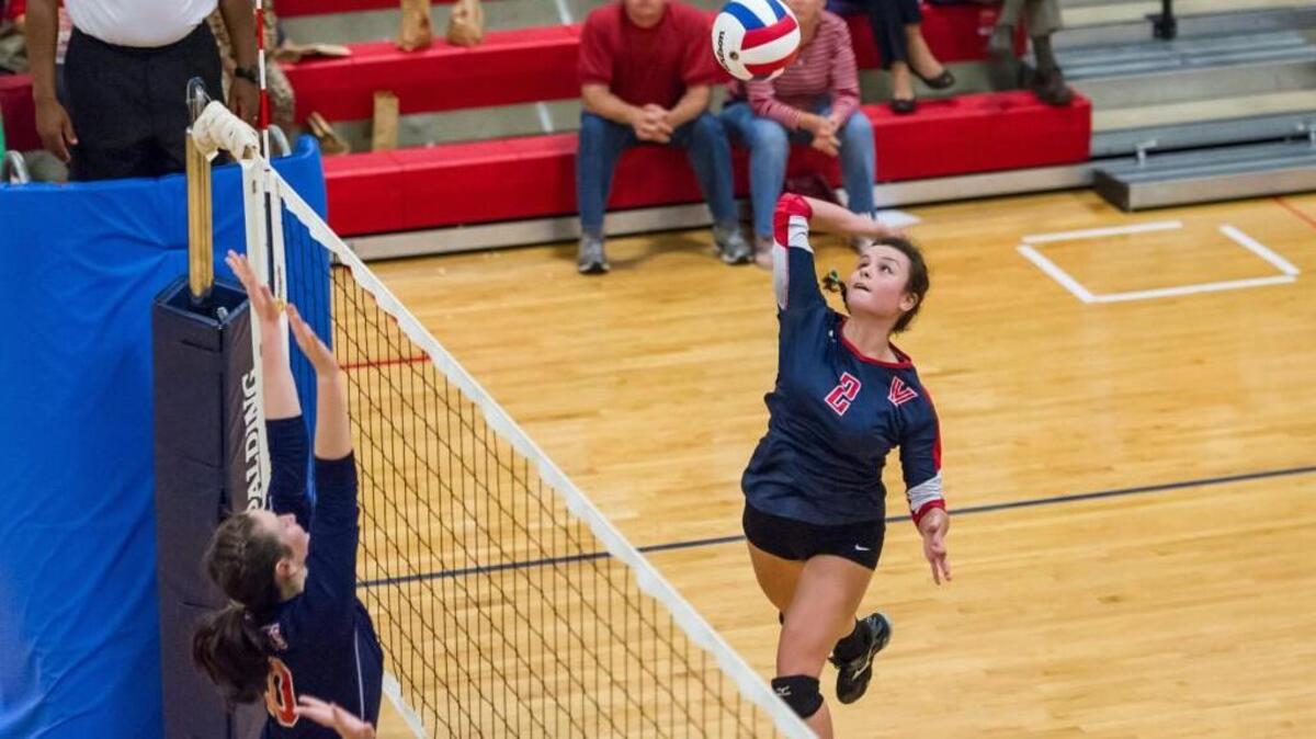 Voyager Academy's Maggie Liller #2 spikes the ball during Voyager Academy's 3-2 victory over Franklin Academy at Franklin Academy in Wake Forest, NC on Thursday, October 29.