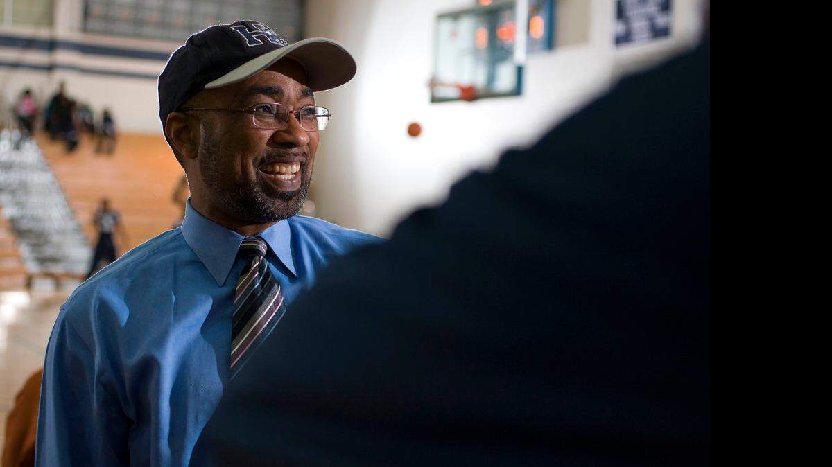 
Hillside High School coach Ovester Grays talks with Dexter Smith on Feb. 17, 2009. 
