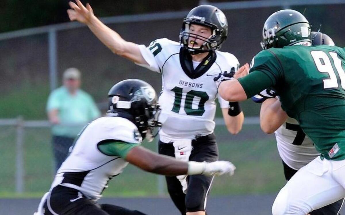 
Cardinal Gibbons quarterback Wesley Wagner throws a pass last year. He and Anton Stoneking are still competing for the starting job as the Crusaders look to open their 4A campaign.
