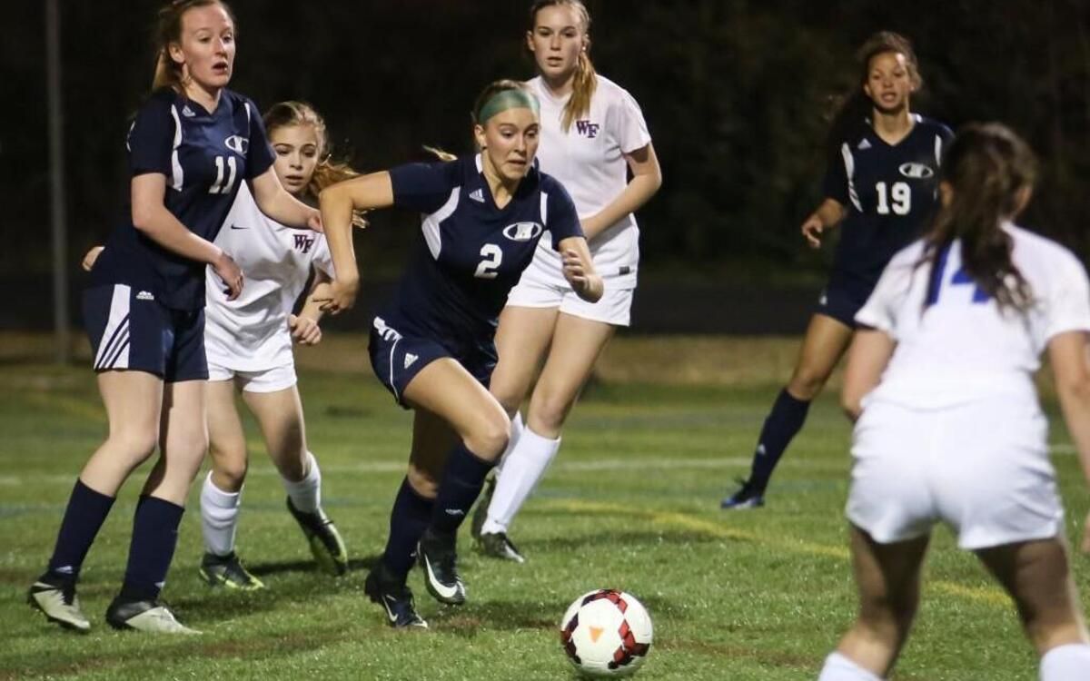 Heritage's Michaella Arteta (2) chases down a loose ball in the box during Heritage's soccer game at Wake Forest on Wednesday, March 22, 2017. Heritage won the game 2-0.