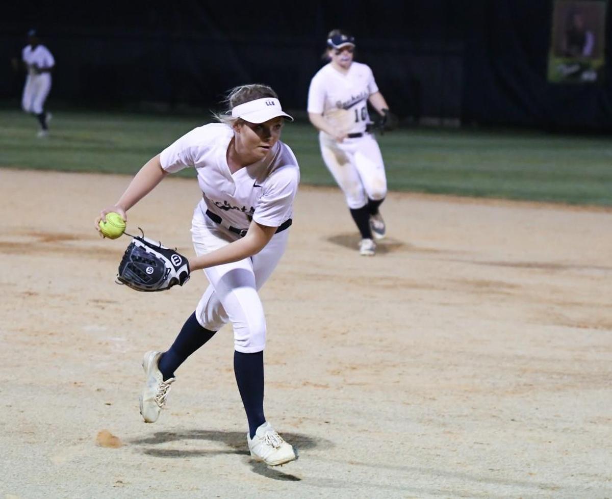 Lee County softball pitcher Whitney Sanford hurls a ball to the plate. The Lee County Yellow Jackets played the Pinecrest Patriots in a softball game that took place in Sanford, N.C. on Thursday, March 9 2017. Lee County won 4-3.