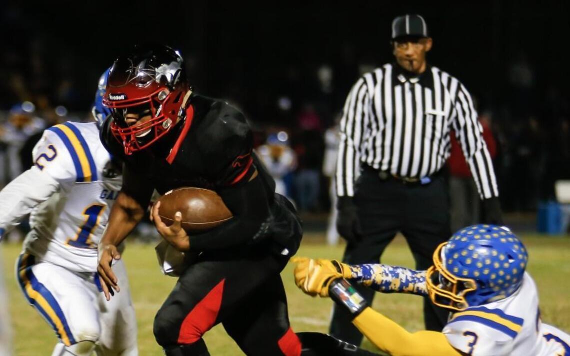 Middle Creek rolls over Garner in 4AA football playoffs