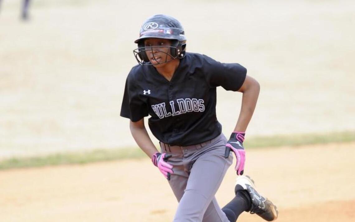 Southeast Raleigh softball learning with every game