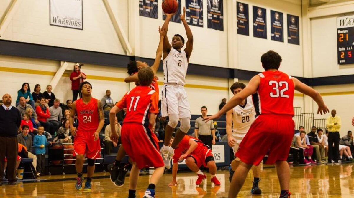 St. David’s Kris Monroe (2) shoots the ball as the Grace Christian School Eagles took on the St David's School Warriors at St. David's School in Raleigh, NC on Tuesday, January 19.