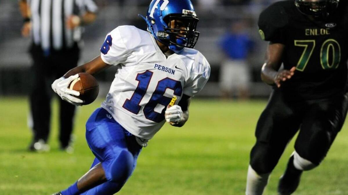 Person's Dontavian Smith (16) runs in the ball for a touchdown against Enloe in Raleigh, N.C. on Friday, September 16, 2016.