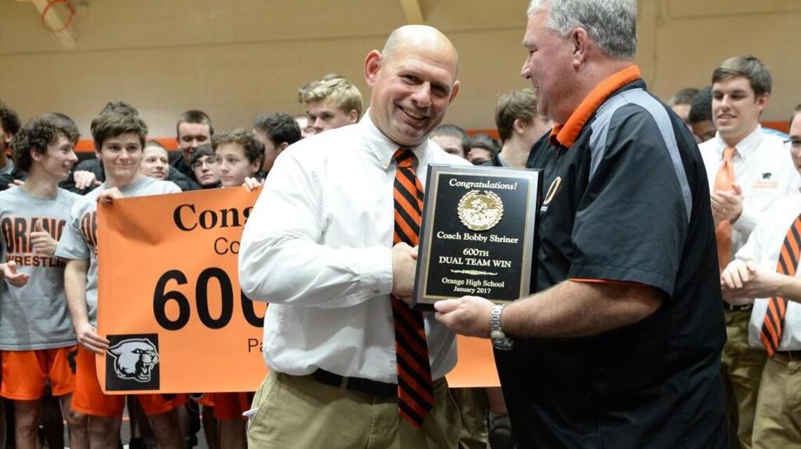 Orange wrestling coach Bobby Shriner leads the Panthers’ passion