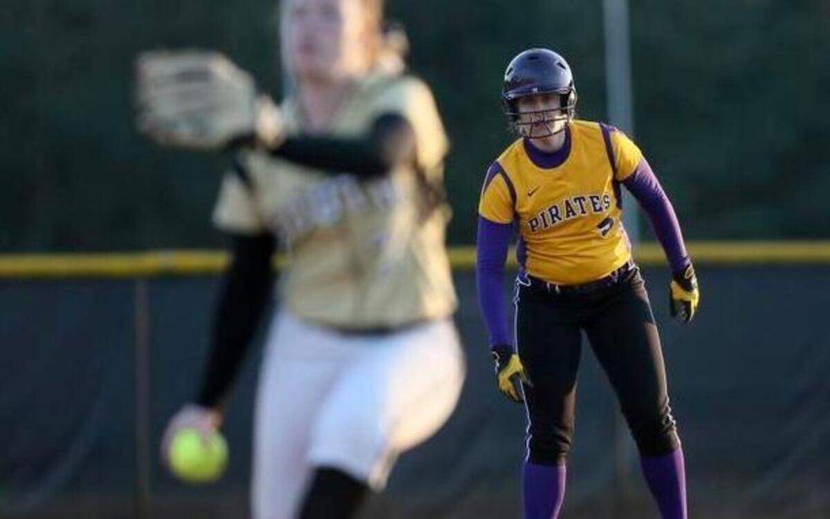 
Corinth Holders’ Holly Price watches the pitch from second base as she readies to get her lead.
