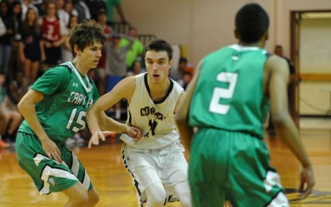 Apex sweeps Cary boys & girls basketball in likely the last meetings in Cougars’ home gym