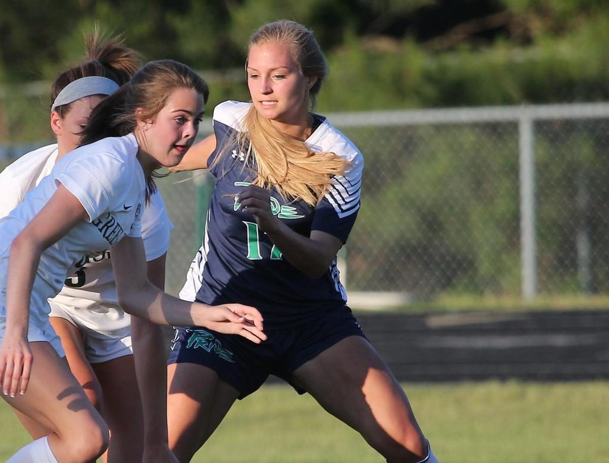 Leesville Road's Rachel Golden (right, 17) defends a Green Hope player during the Leesville Road high school soccer match with Green Hope high school in the third round of the state high school playoffs at Cary N.C. on May 16, 2017. Green Hope won 5-0.