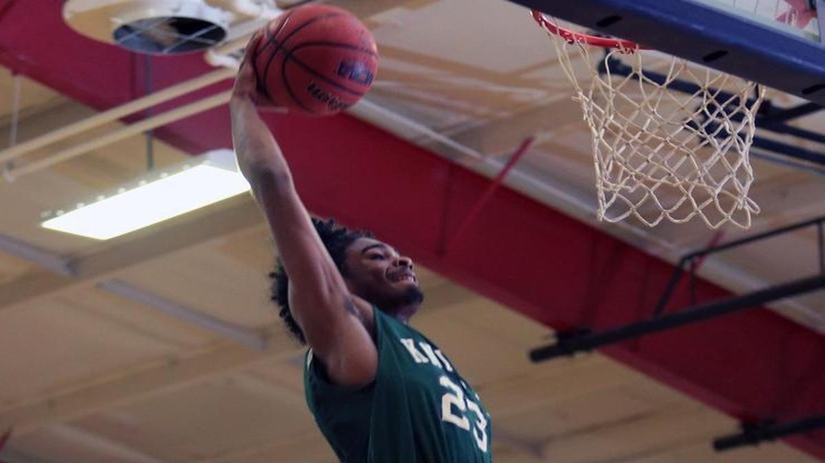 UNC recruit Coby White goes up for the dunk during the Greenfield at Wayne Country Day boys basketball game on January 20, 2017.