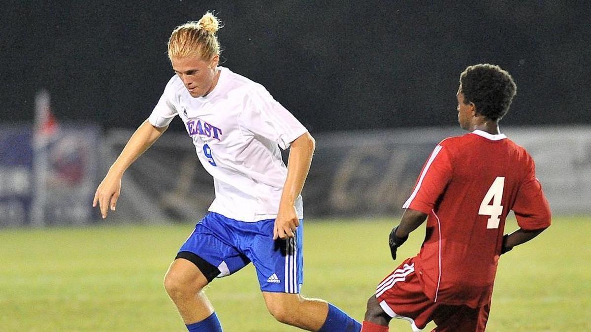 The East’s Matthew Bissette (9) controls the ball while defended by West’s Christopher Walker (4). The NCCA girls and boys East-West All-Star Soccer game were held at Bryan Park in Greensboro, N.C. on July 19, 2016. The East won both of the games by 2-1 scores.