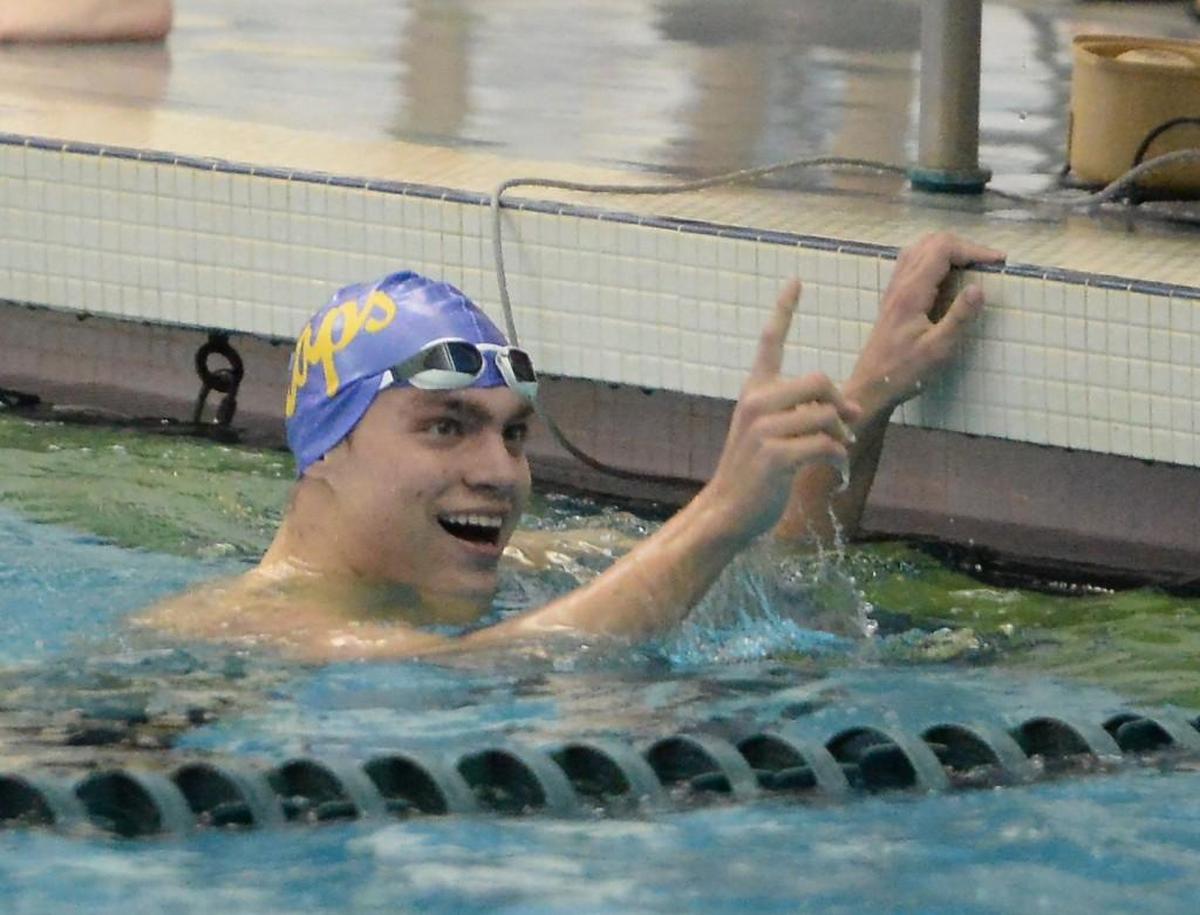 Jack Messenger of Broughton celebrates at the end of the Men 100 Yard Freestyle race during the NCHSAA 4A Swimming Championships that took place at the Triangle Aquatic Center in Cary, N.C. on Friday, February 10, 2017.