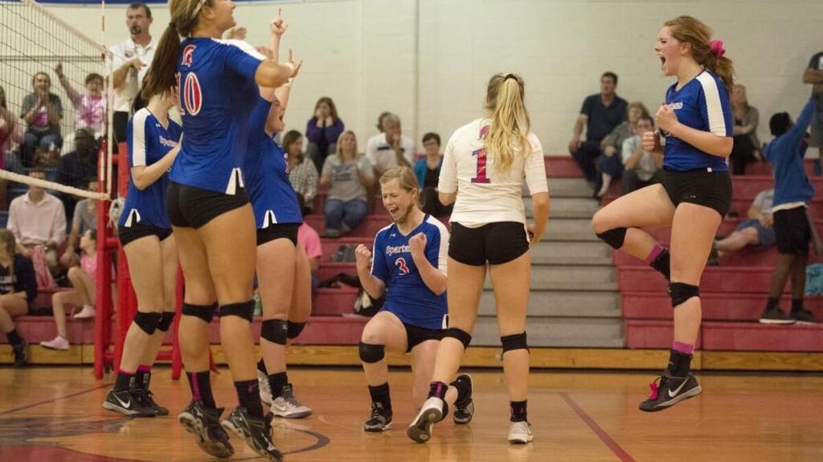 Sanderson celebrates comeback and takes Millbrook into fifth set during CAP-8 4A matchup between Sanderson and Millbrook that took place at Sanderson High School on October 4, 2016 in Raleigh, North Carolina. Sanderson comes back to beat Millbrook in 5 sets, 3-2.