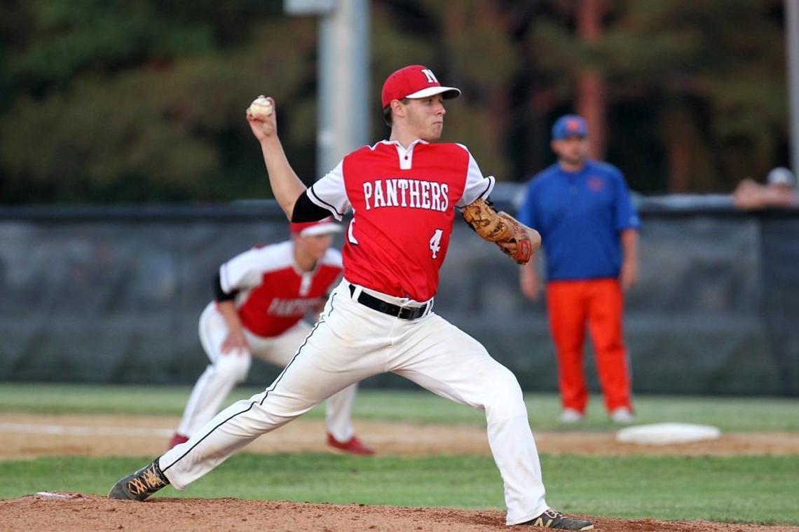 North Johnston's Dylan Radford (4) delivers the pitch during the Randleman High School baseball game against North Johnston High School in Kenly, N.C. on Tuesday, May 16, 2017.