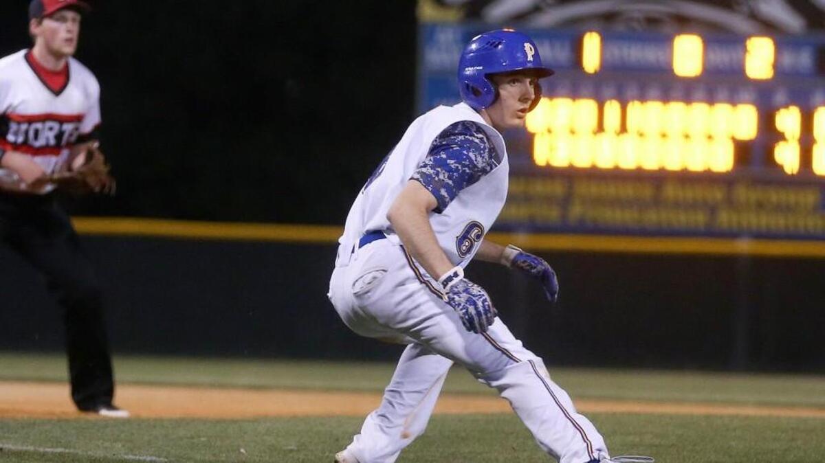 Princeton’s Hunter Mitchell (6) gets a lead off of third in the bottom of the 10th inning. He was able to get home for the winning run on a wild pitch.