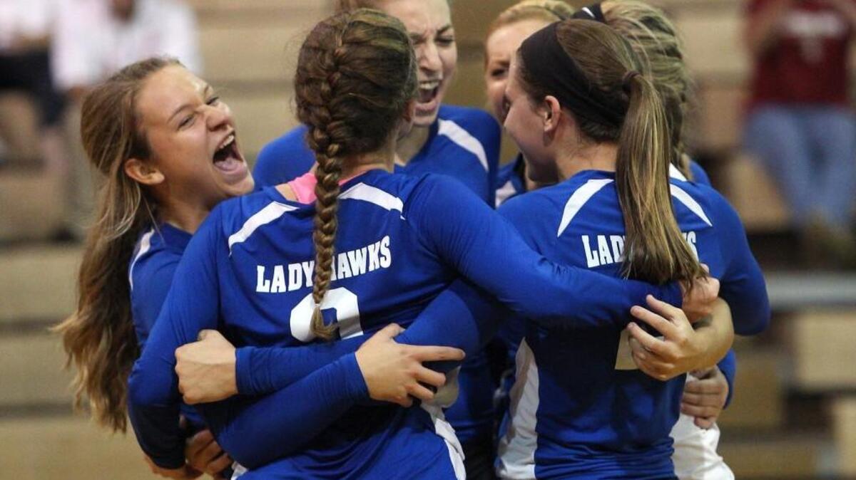 
Triton celebrates a victory during their game against South Johnston High School on Tuesday, September 22, 2015 in Erwin, N.C. Triton won 3-2.
