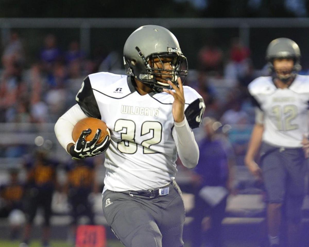 East Chapel Hill's Jalen Williams runs the ball during the JV football game between the East Chapel Hill Wildcats and the Carrboro Jaguars, which was played in Carrboro on Thursday, August 24, 2017.