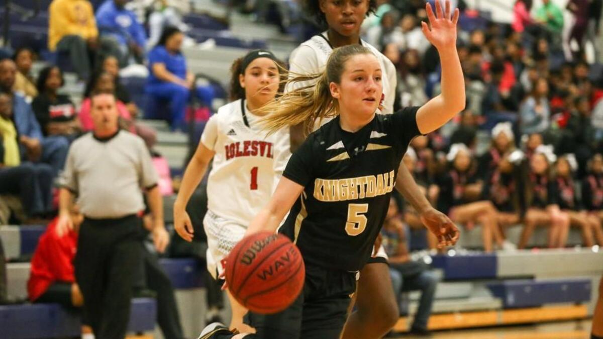 Knightdale's Devan Jarrell (5) drives baseline. The Knightdale Knights visited the Rolesville Rams in high school boys and girls basketball games on Jan. 9, 2018.