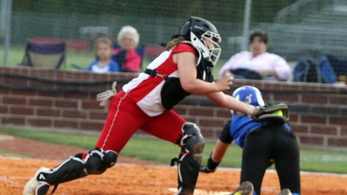Chatham Central catcher Sammi Barker applies the tag for an out at the plate during the Jordan-Matthews at Chatham Central softball game in Bear Creek, N.C. on April 21, 2016.