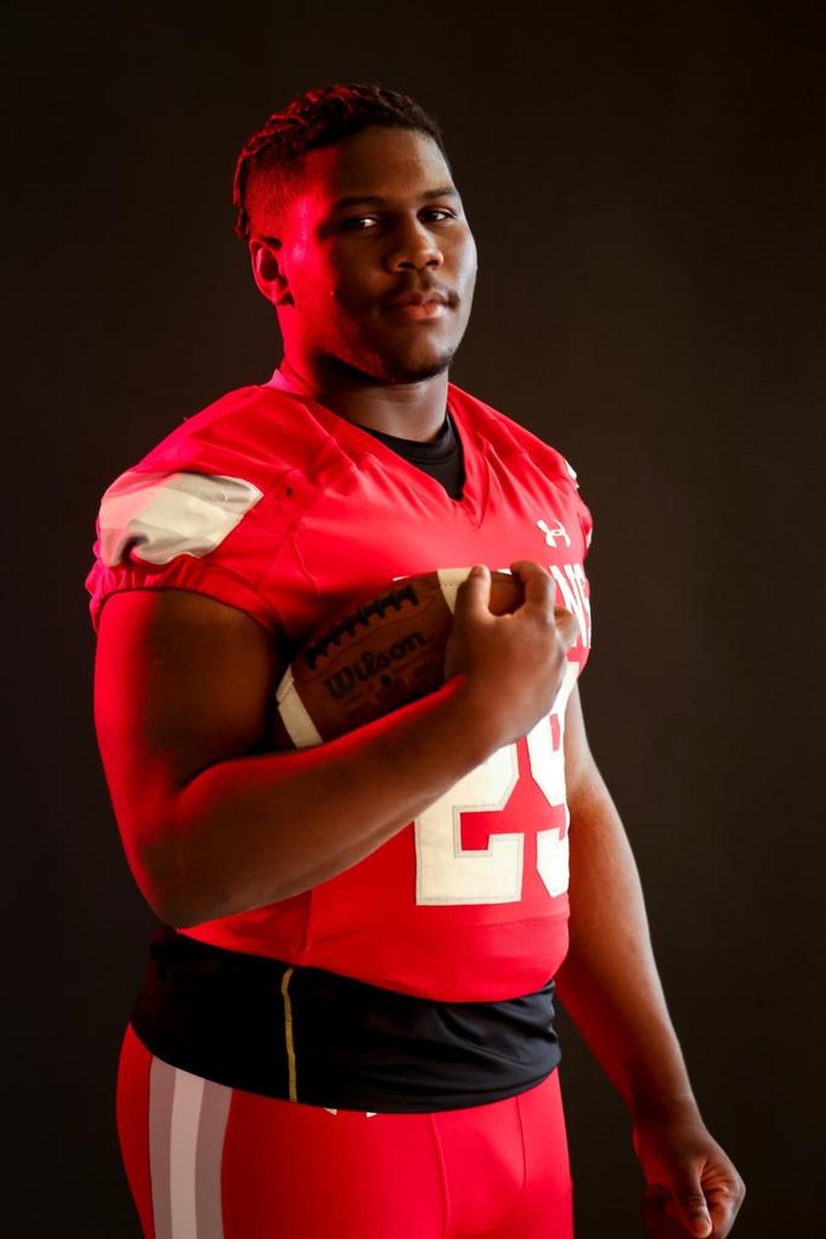 Sanderson's Trent Pennix, a member of the N&O All-Metro Football Team, poses for a portait on Thursday, December 21, 2017.