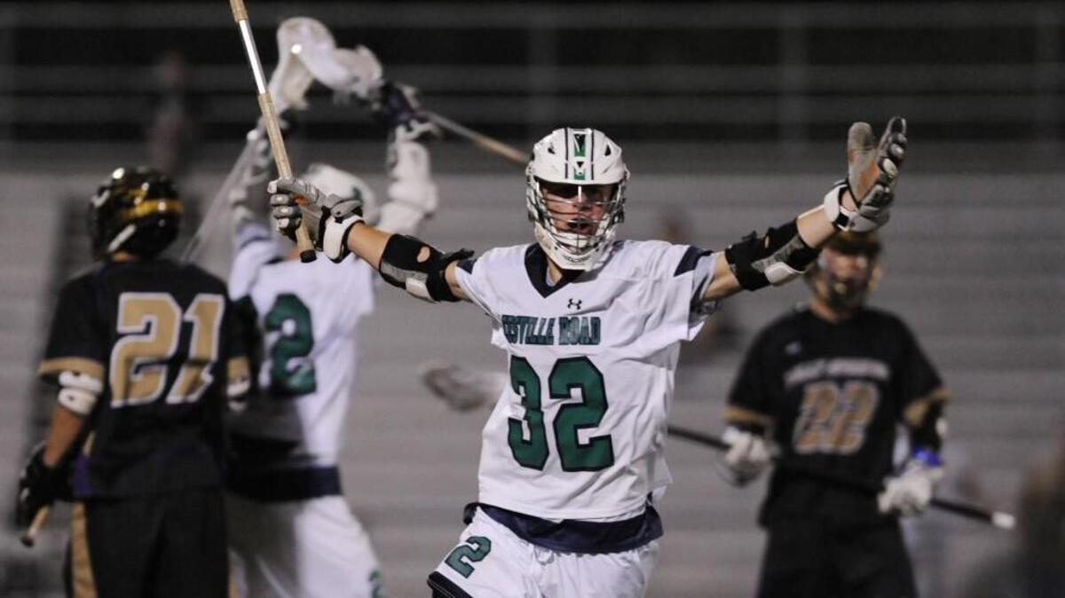 Leesville Road's Alex Shearer (32) celebrates a goal in Raleigh, N.C. on Tuesday, May 10, 2016. Leesville Road won in overtime 8-7.