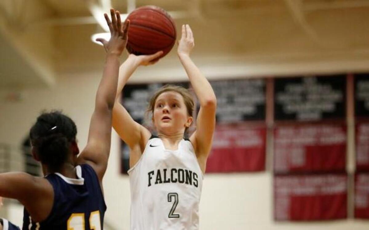 South Central's Anna Mewborn (2) with the pull up jumper over D.H. Conley's Elana Fuller (11) during the D.H. Conley High School girl's basketball game against South Central High School High School in Winterville, N.C. on Thursday, February 9, 2017.